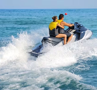 Couple riding ATVs in Bali
